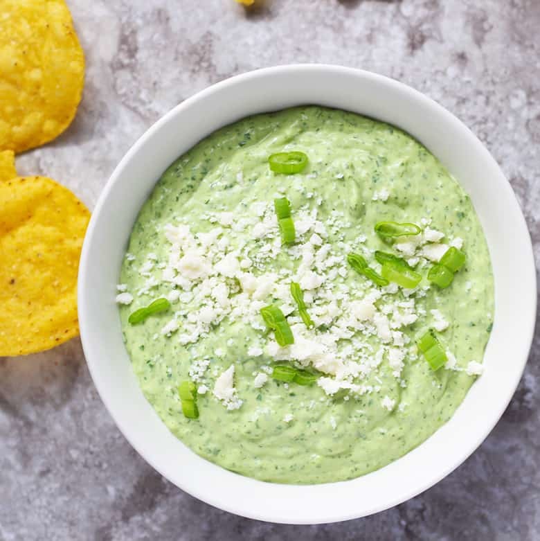 Creamy Jalapeno & Avocado Salsa. A fresh and creamy salsa with some bite. Great for chips, tacos, fish and chicken. Can be used as a veggie dip too! This vegetarian salsa is easy and fast in a food processor. | FusionCraftiness.com