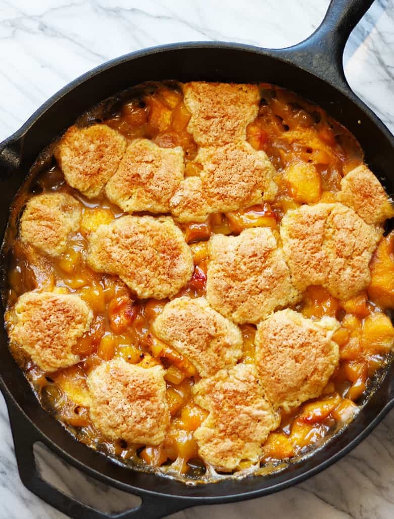 French Peach Cobbler in a cast iron skillet.