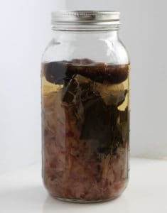 A large mason jar with bonito, Kombu and shitake.