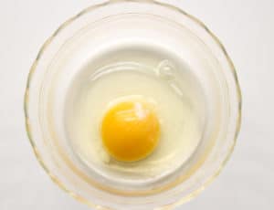 Single egg in a small glass bowl.