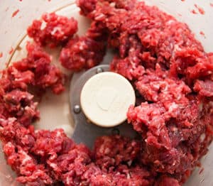 Ground beef in food processor.