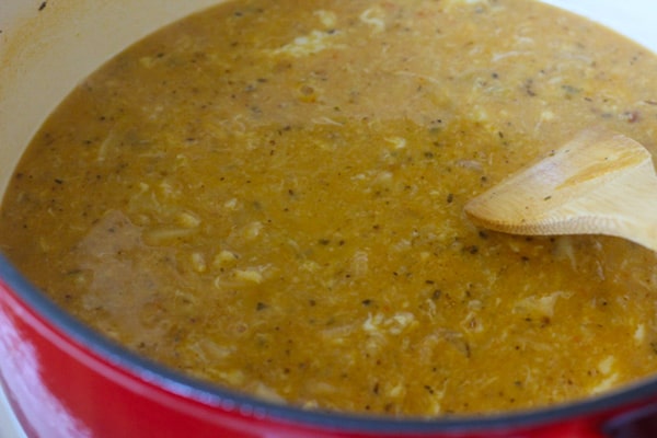 Soup pot with soup.