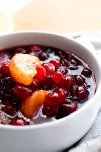 Homemade Cranberry sauce in a white bowl.