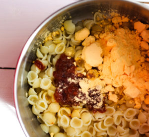 Gochujang Macaroni ingredients in pot.